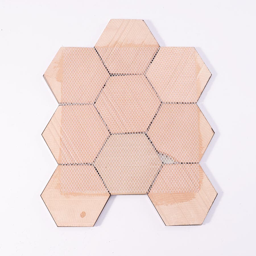 Back view of silver hexagon stainless steel mirror tile sheet