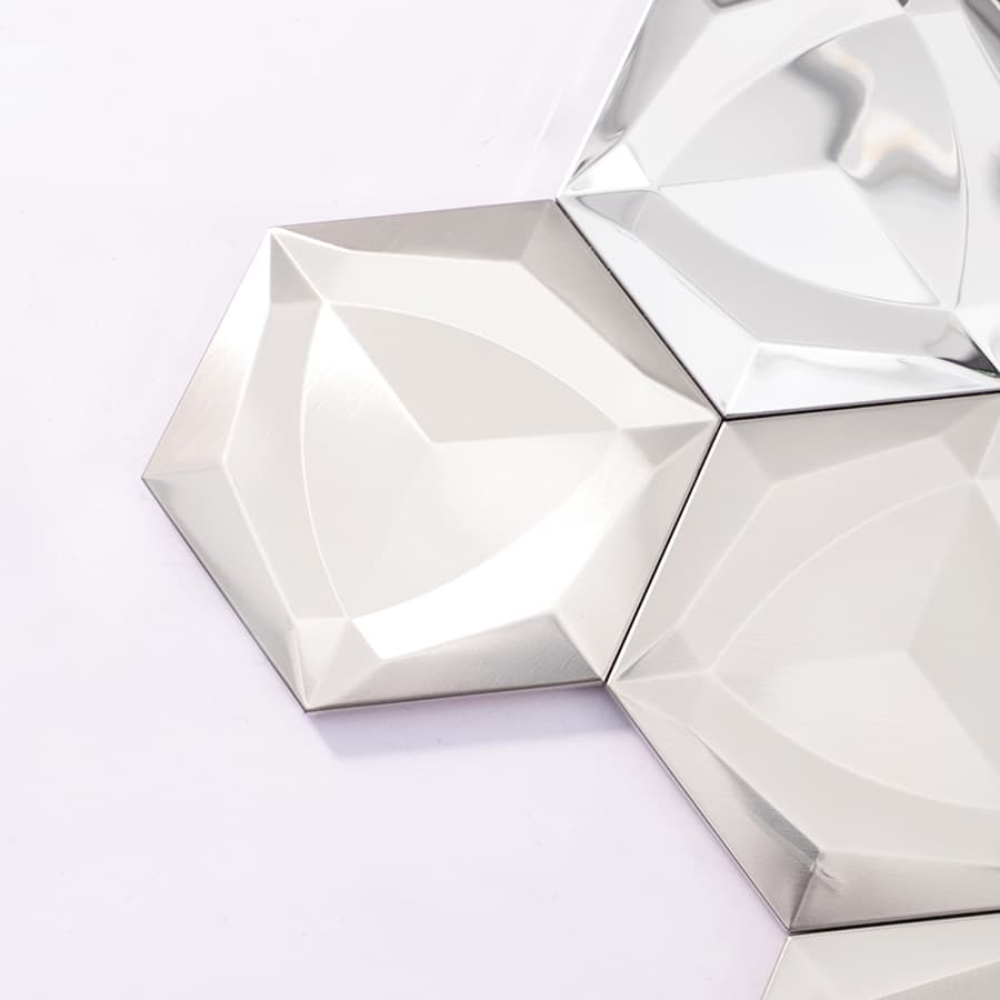 Close up of silver hexagon stainless steel mirror tile surface