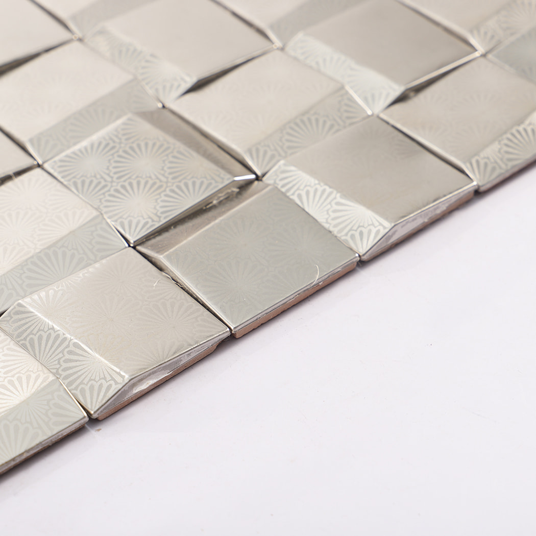 Side view showing thickness and raised 3D surface of silver stainless steel metal mosaic 
