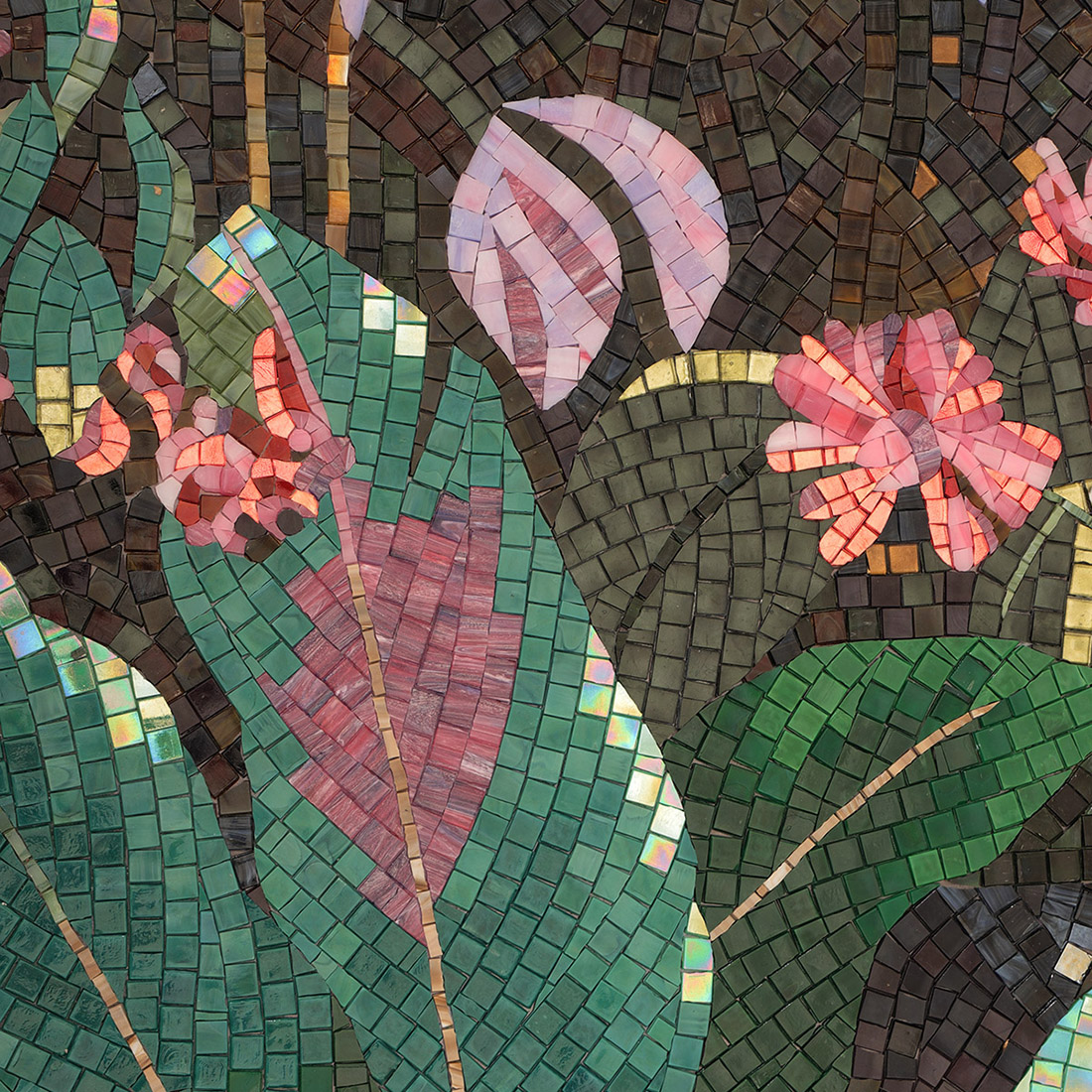Tropical flower and leaf detail in a dark forest glass mosaic mural