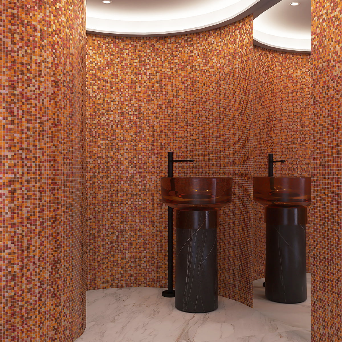 Warm-toned mosaic tile walls with twin amber glass sinks and a luxurious curved design