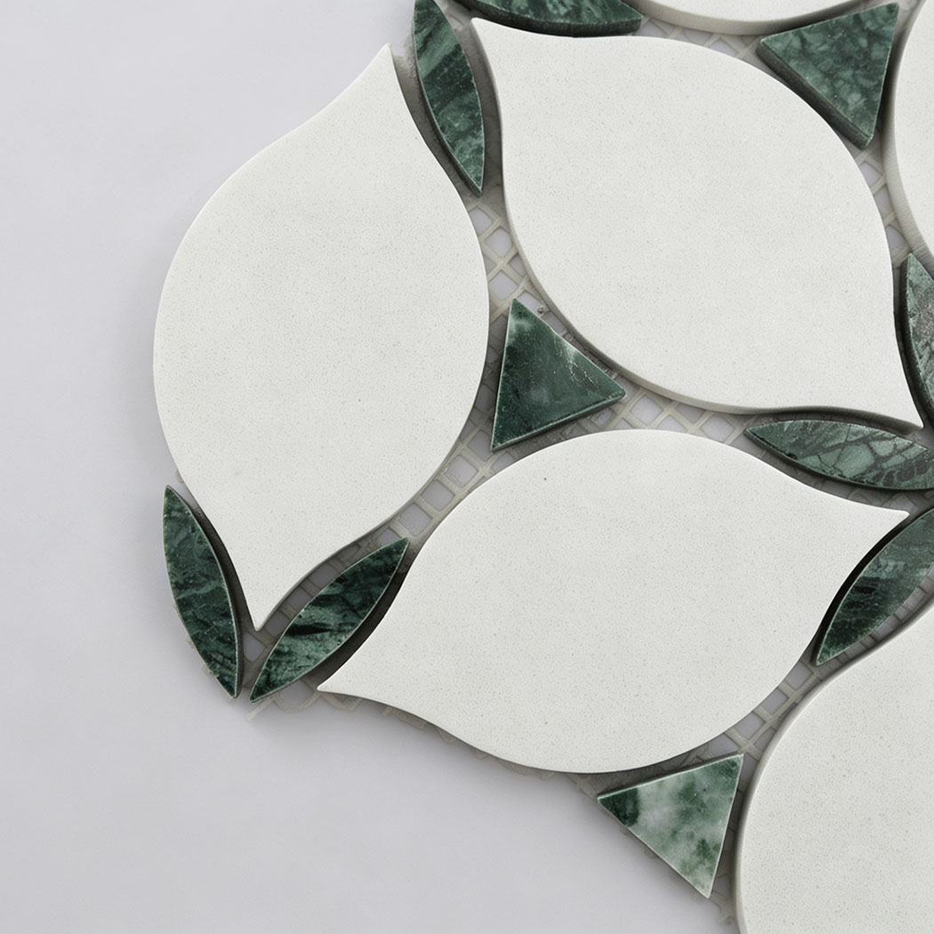 Close-up of white leaf and green marble accent mosaic tile