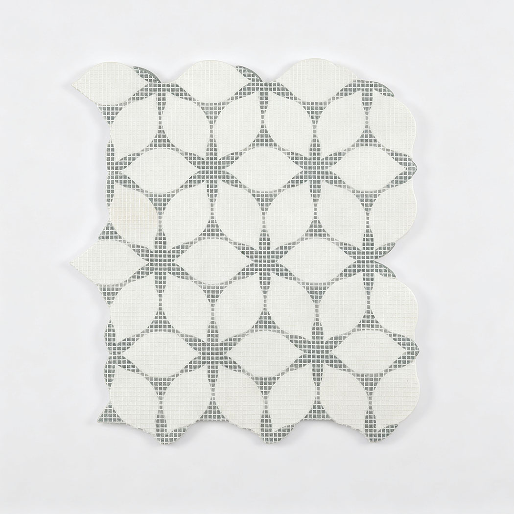 Mesh back view of white and green leaf pattern mosaic tile