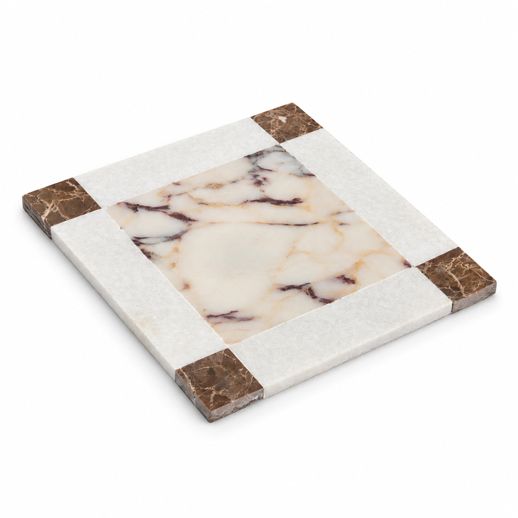 Angled view of white marble border mosaic tile
