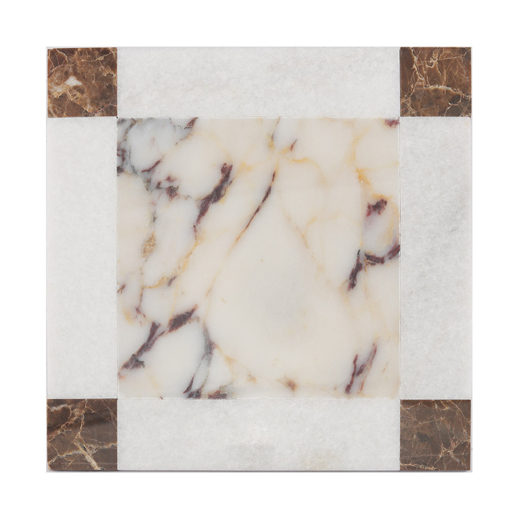 Front view of white marble border mosaic tile with brown corner accents