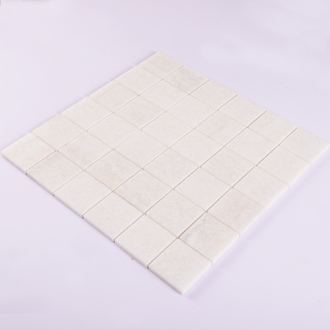 Perspective view of square white marble mosaic sheet on white background