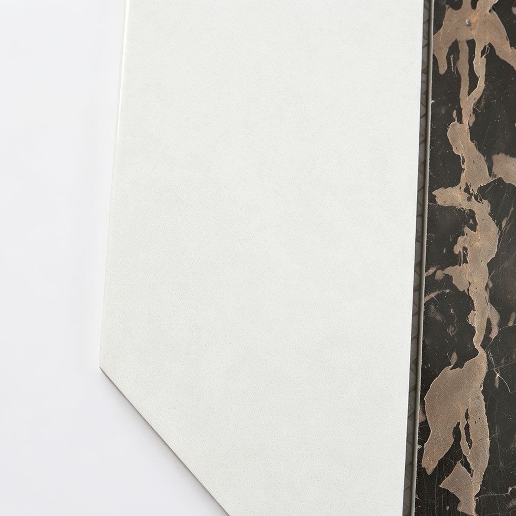 Close-up of white and brown marble geometric mosaic tile surface