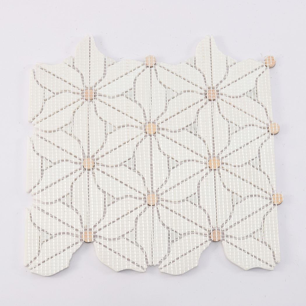 Back view of white daisy marble mosaic tile with mesh backing