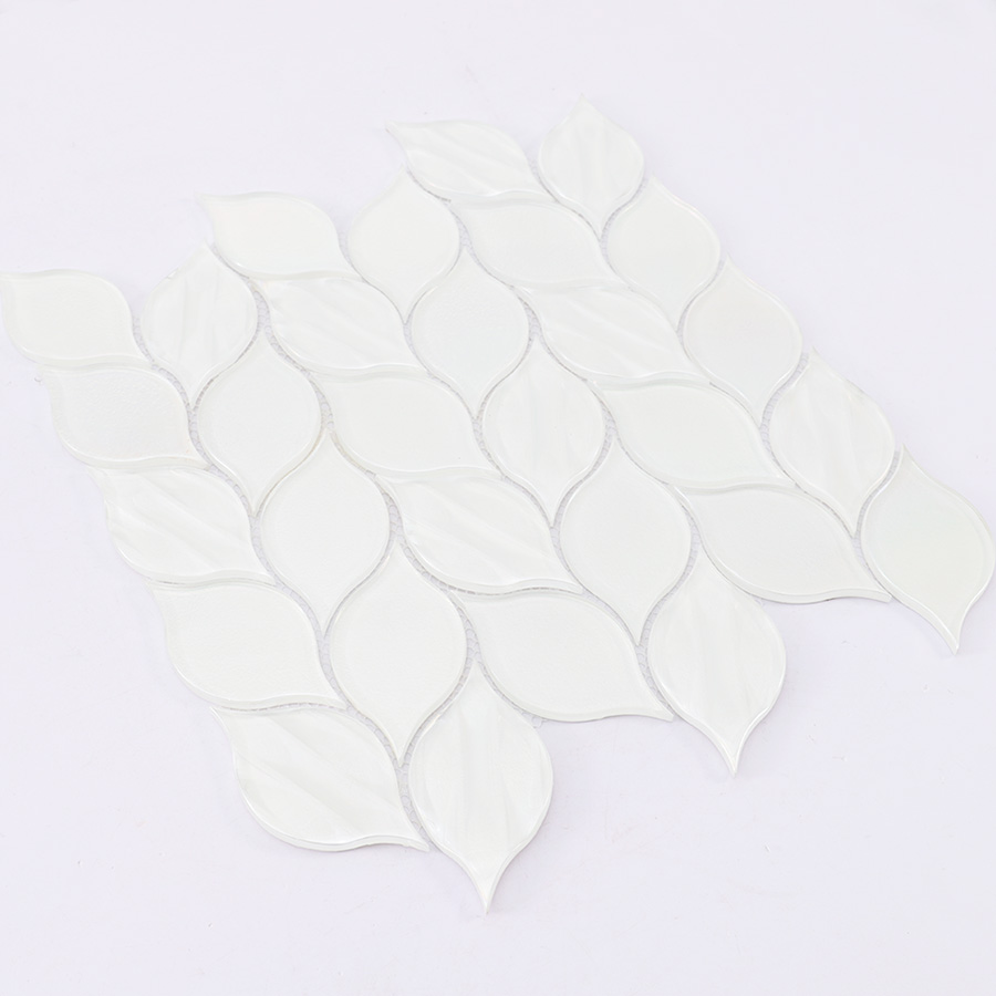 Angled view of white leaf shaped mosaic tile sheet