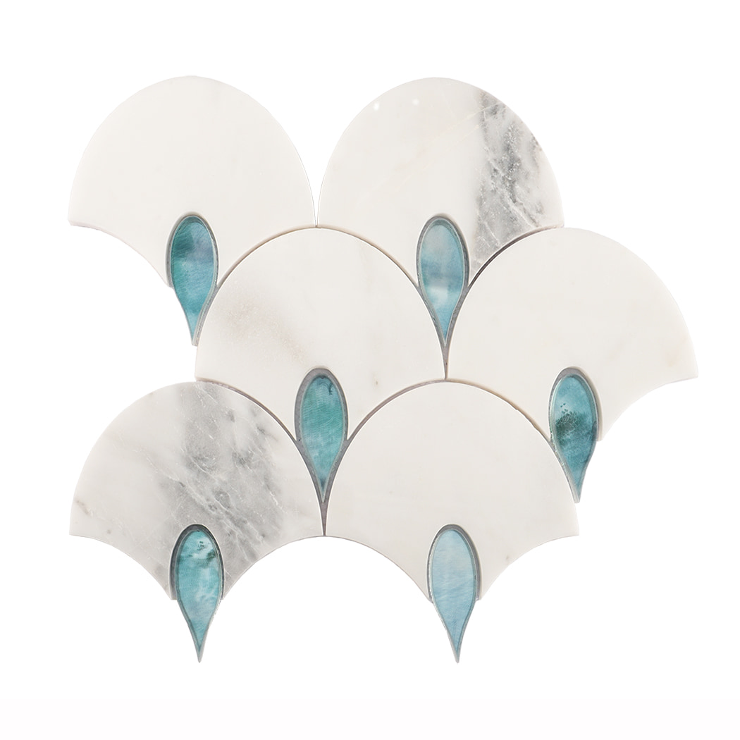 Front view of a white marble fan-shaped mosaic tile with blue glass accents.