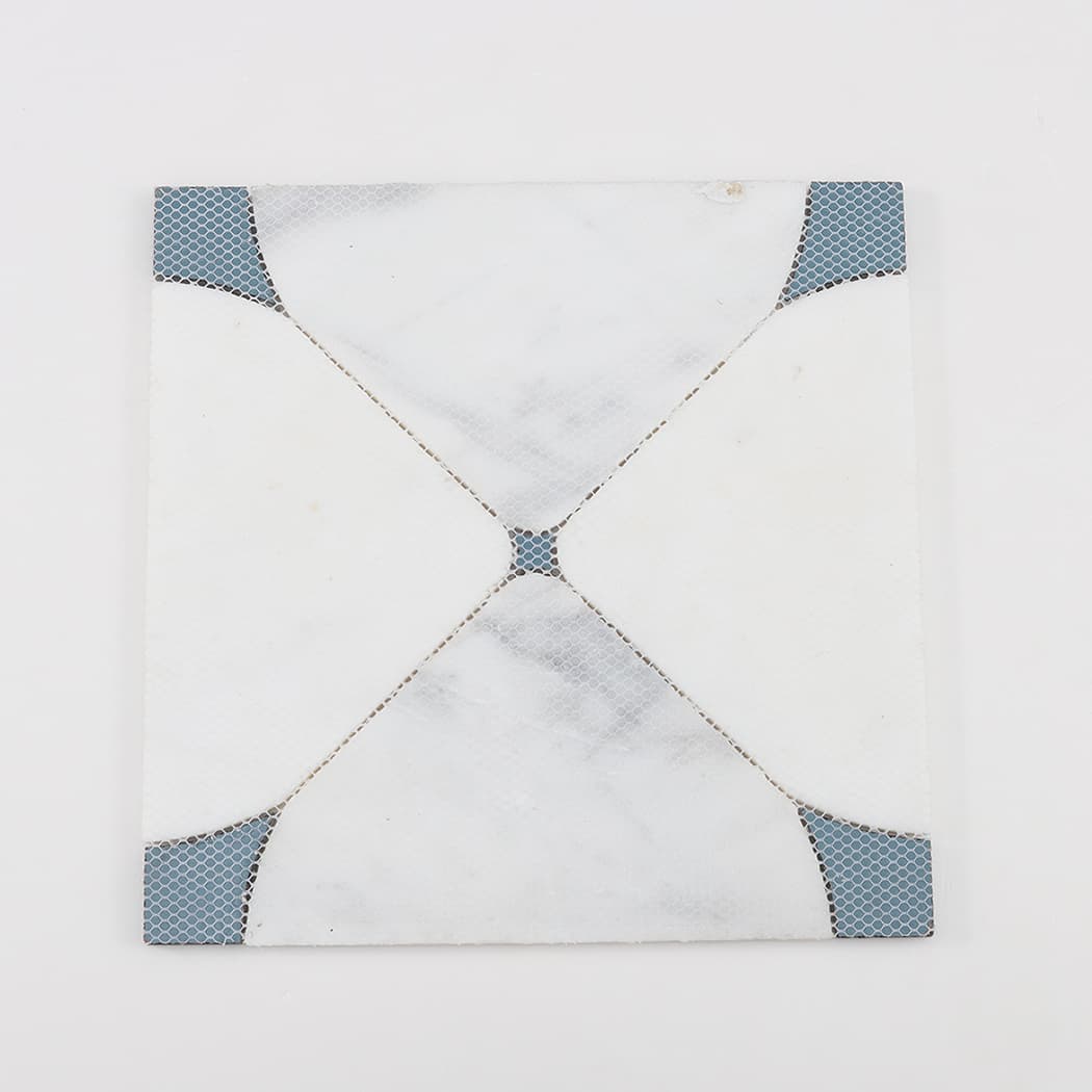 Back view of white square marble waterjet mosaic tile showing mesh backing