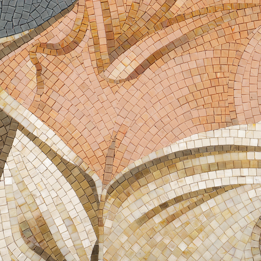 Close up of woman shoulder and dress detail in handmade glass mosaic mural