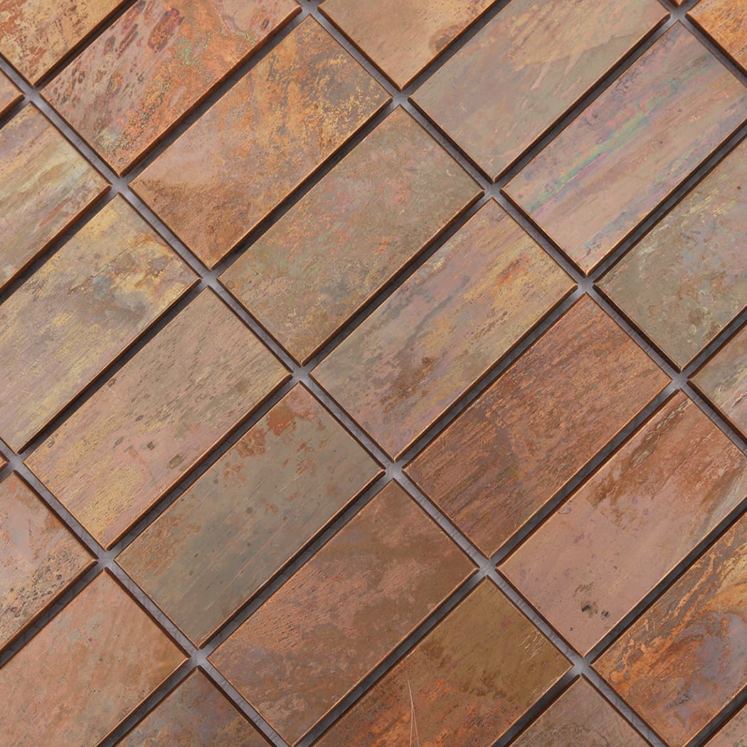 Aged copper rectangular mosaic surface with rustic mixed color texture