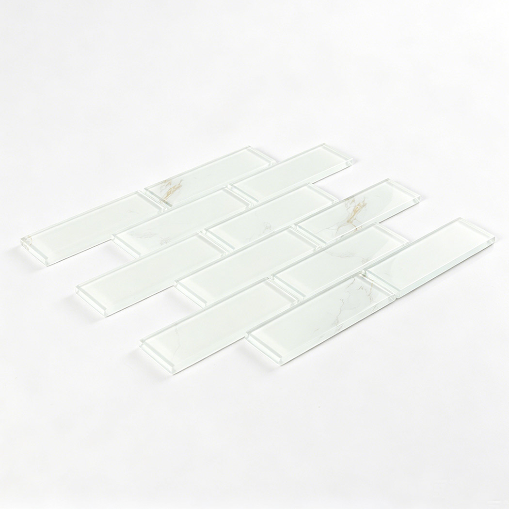 Flat lay of translucent Calacatta glass subway tiles with light gray veining