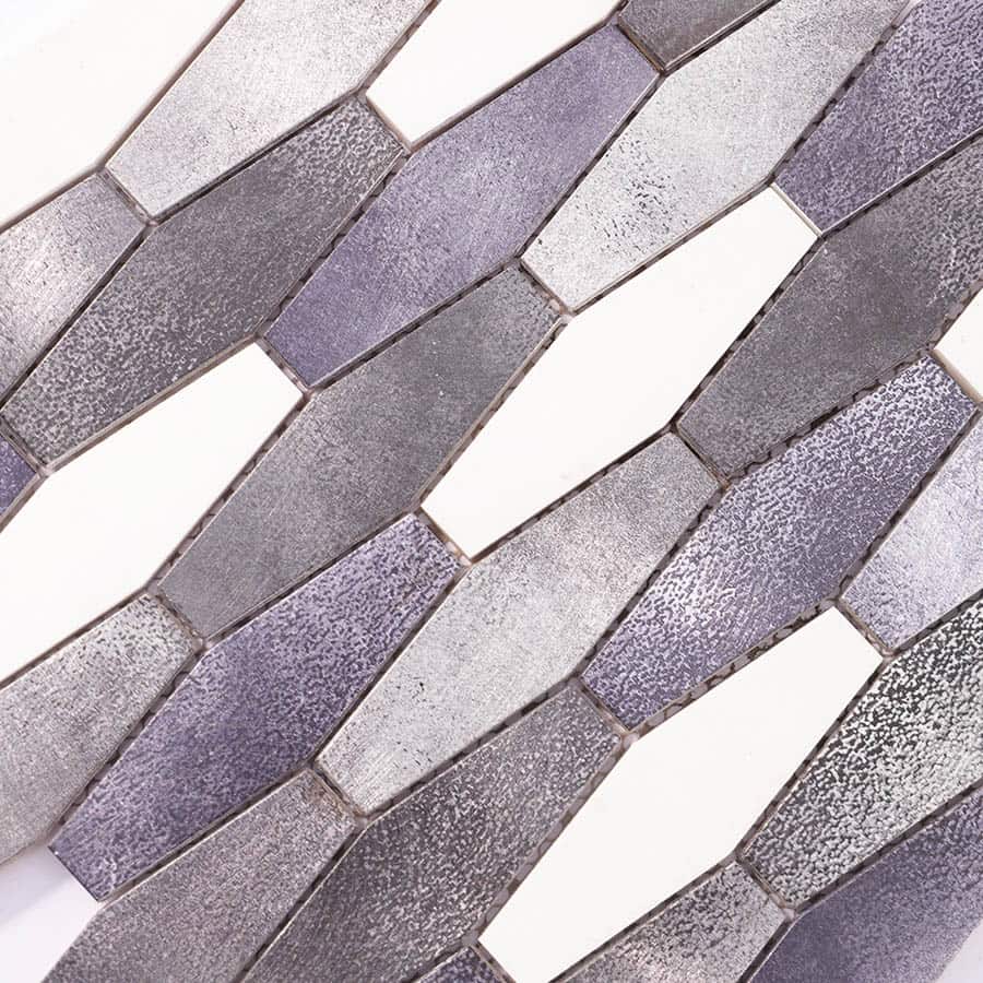 Detailed texture view of aluminum diamond-shaped mosaic tiles