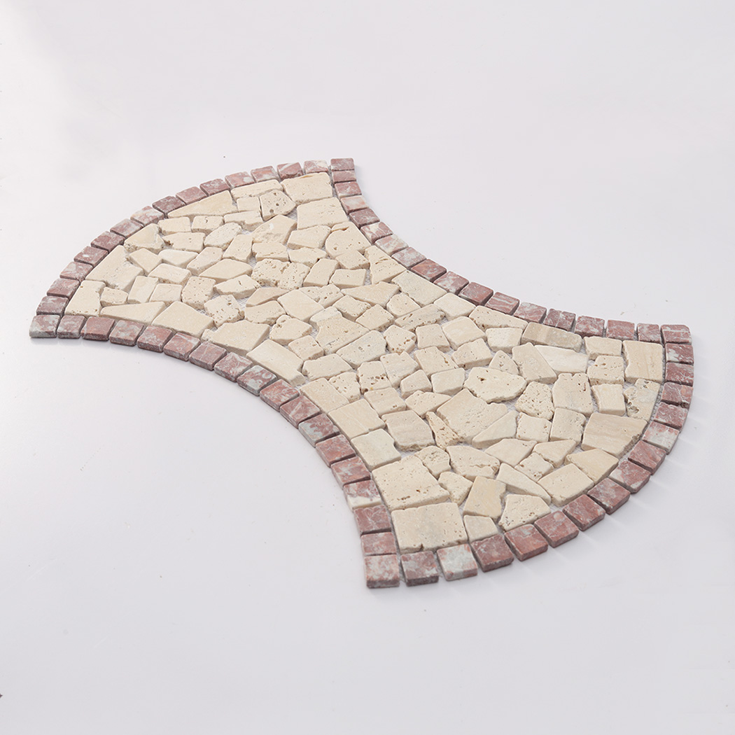 Angled view of beige irregular marble pebble mosaic tile with red border