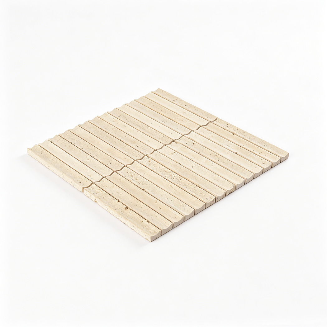 Angled view of beige travertine linear mosaic tile sheet on a white background