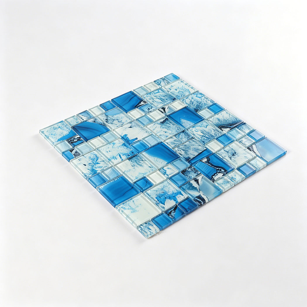 Blue white square glass mosaic sheet with layered glossy chips on white background