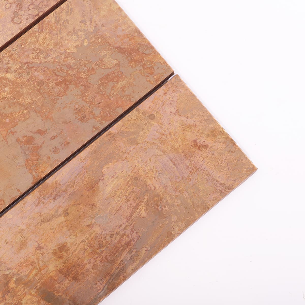  Close-up view of brushed copper tile with color variations
