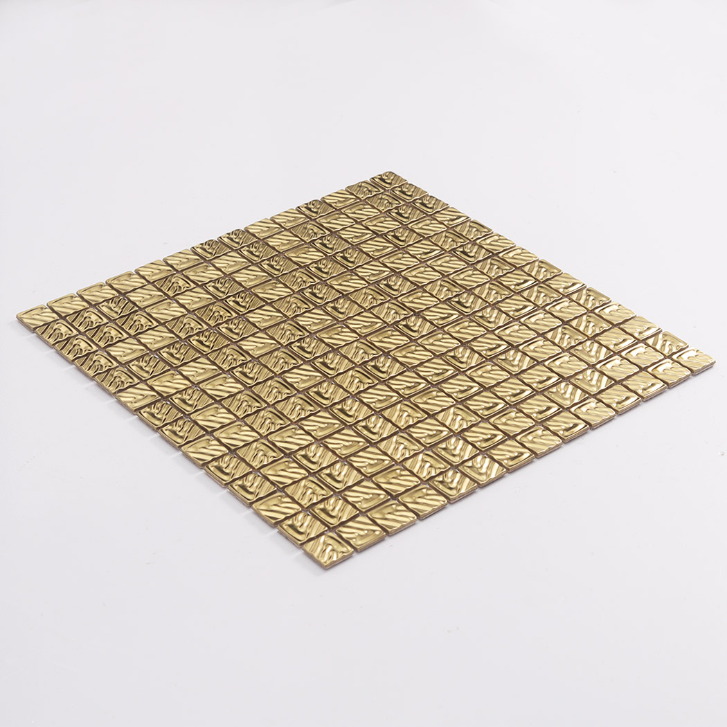 Angled display of gold ripple square mosaic tiles on a full sheet
