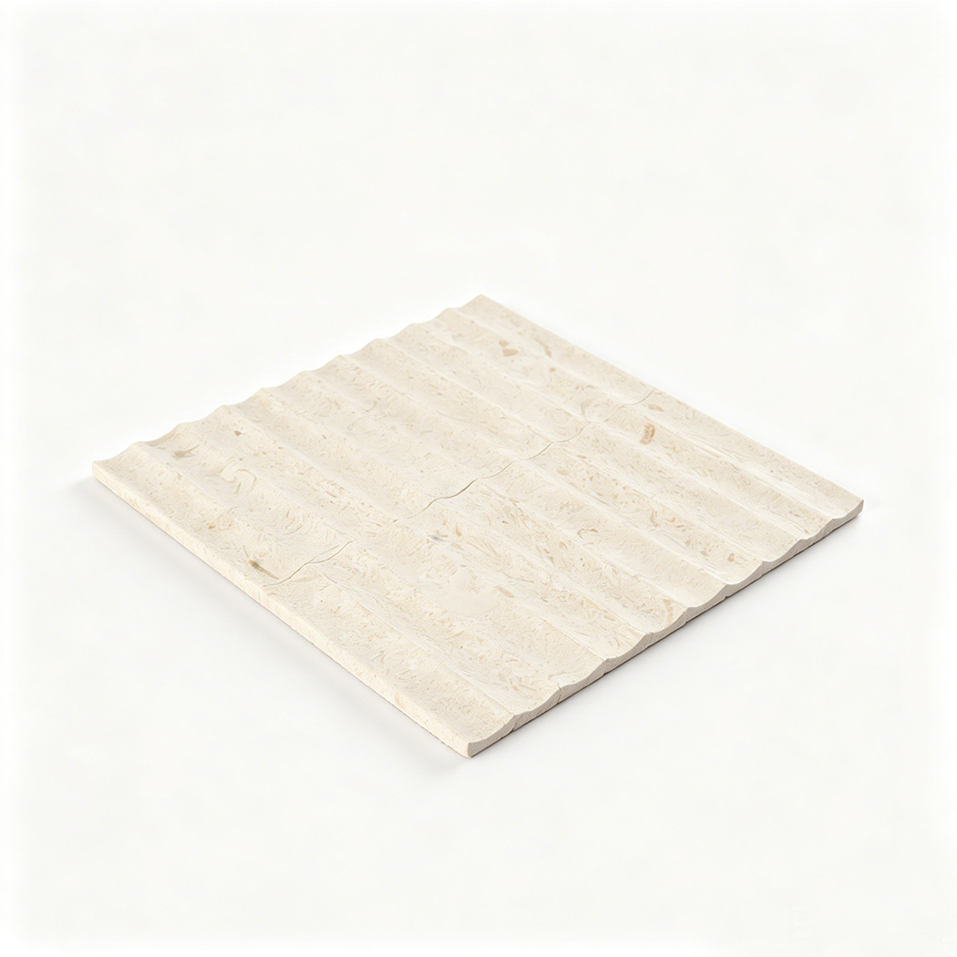 Angled view of seamless limestone fluted mosaic tile sheet highlighting natural stone texture