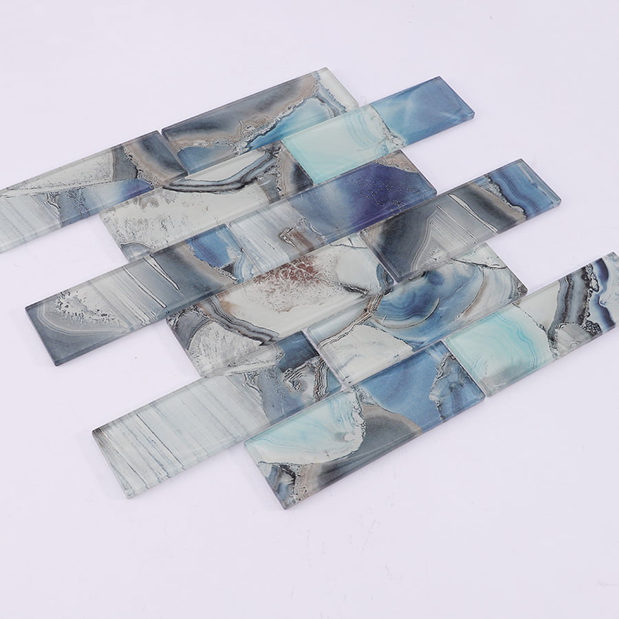 Angled view showing pattern and gloss of blue grey subway glass mosaic tile