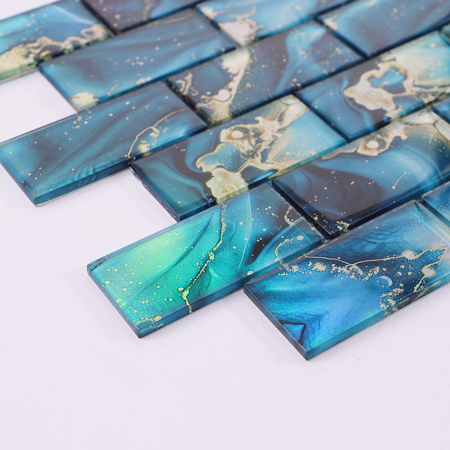 Side view of blue rectangular glass mosaic tile showing thickness and edge finish