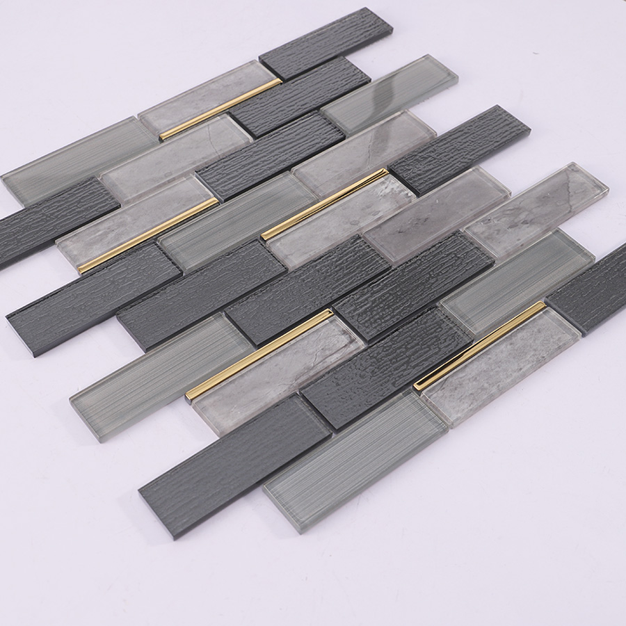 Angled view of dark grey bricks subway glass wall tile showing layout and shine