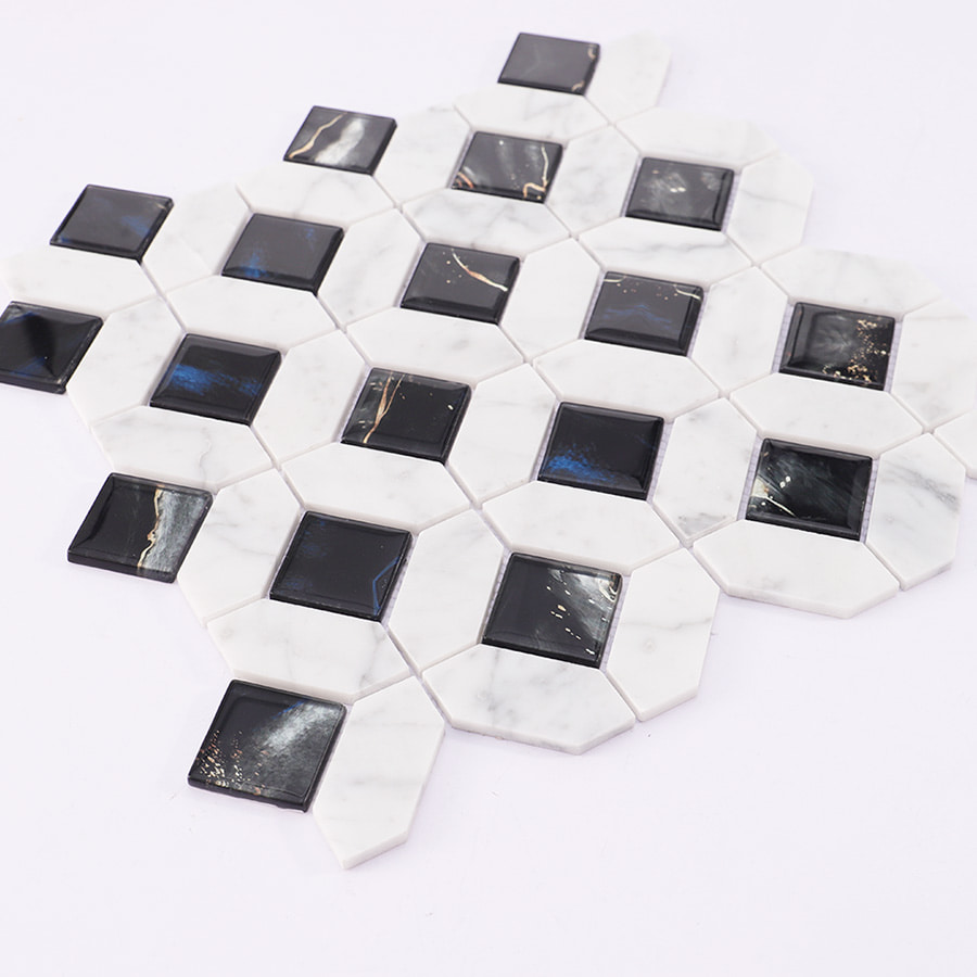 Angled view of marble and black glass mosaic tile sheet layout.
