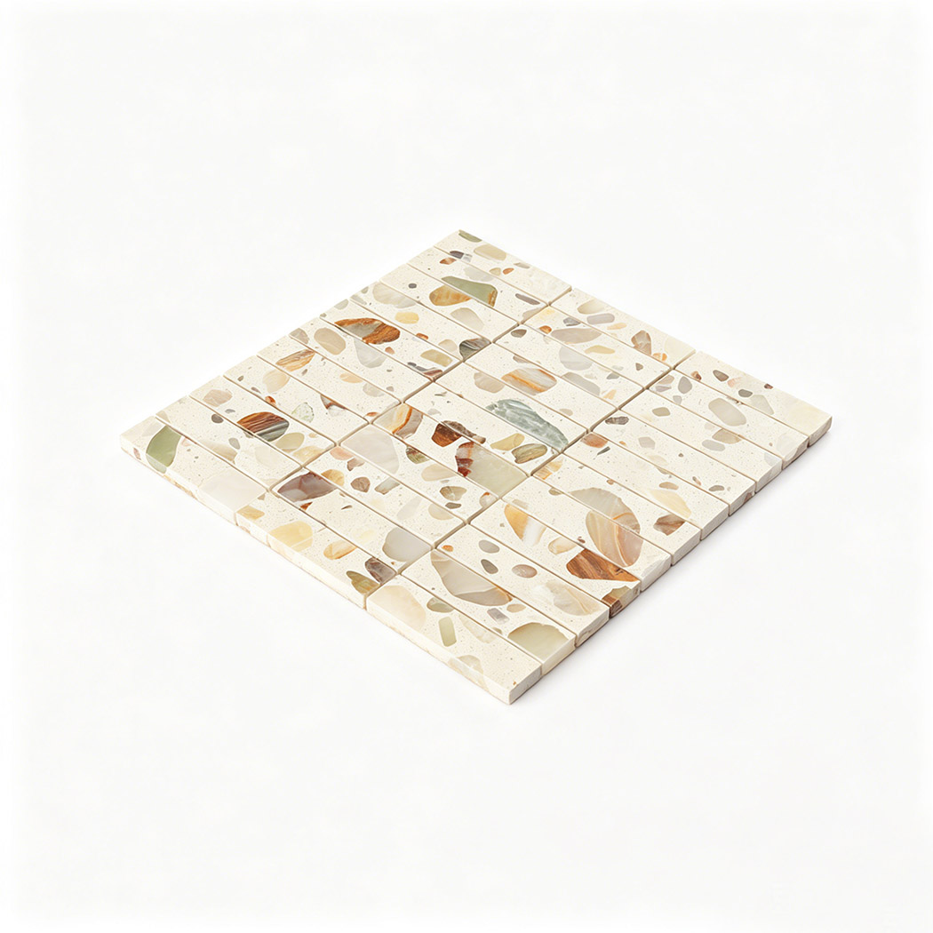 Angled view of terrazzo mosaic showing overall rectangular chip pattern and colors