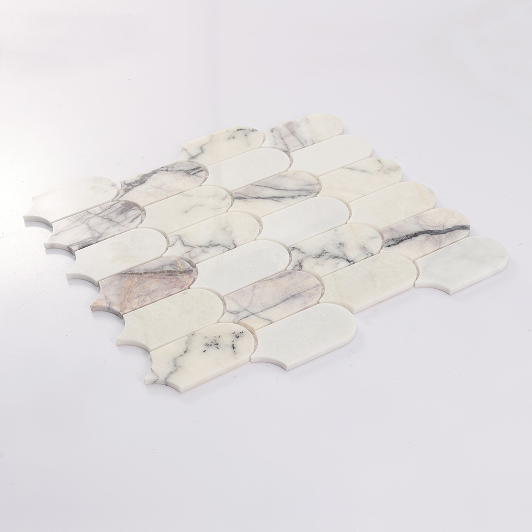 Angled view of white arched marble mosaic tile sheet with gray marble veining