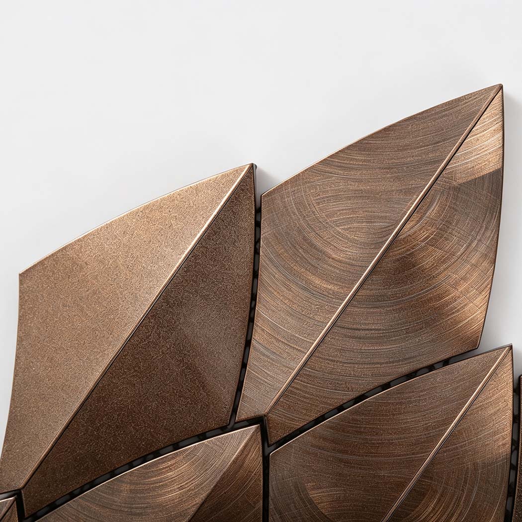 Top angle closeup of antique copper leaf shape aluminum tile texture