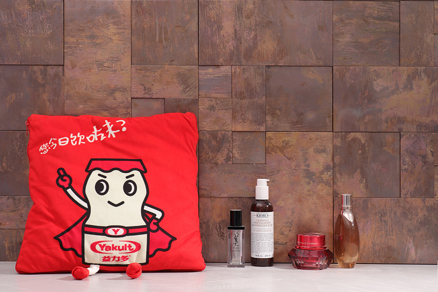 Brown antique copper tile wall design with square layout