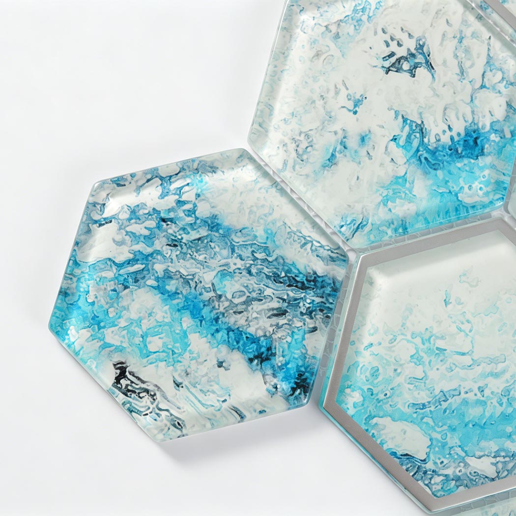 Aqua splash hexagon glass tile detail with white cloudy pattern and silver frame