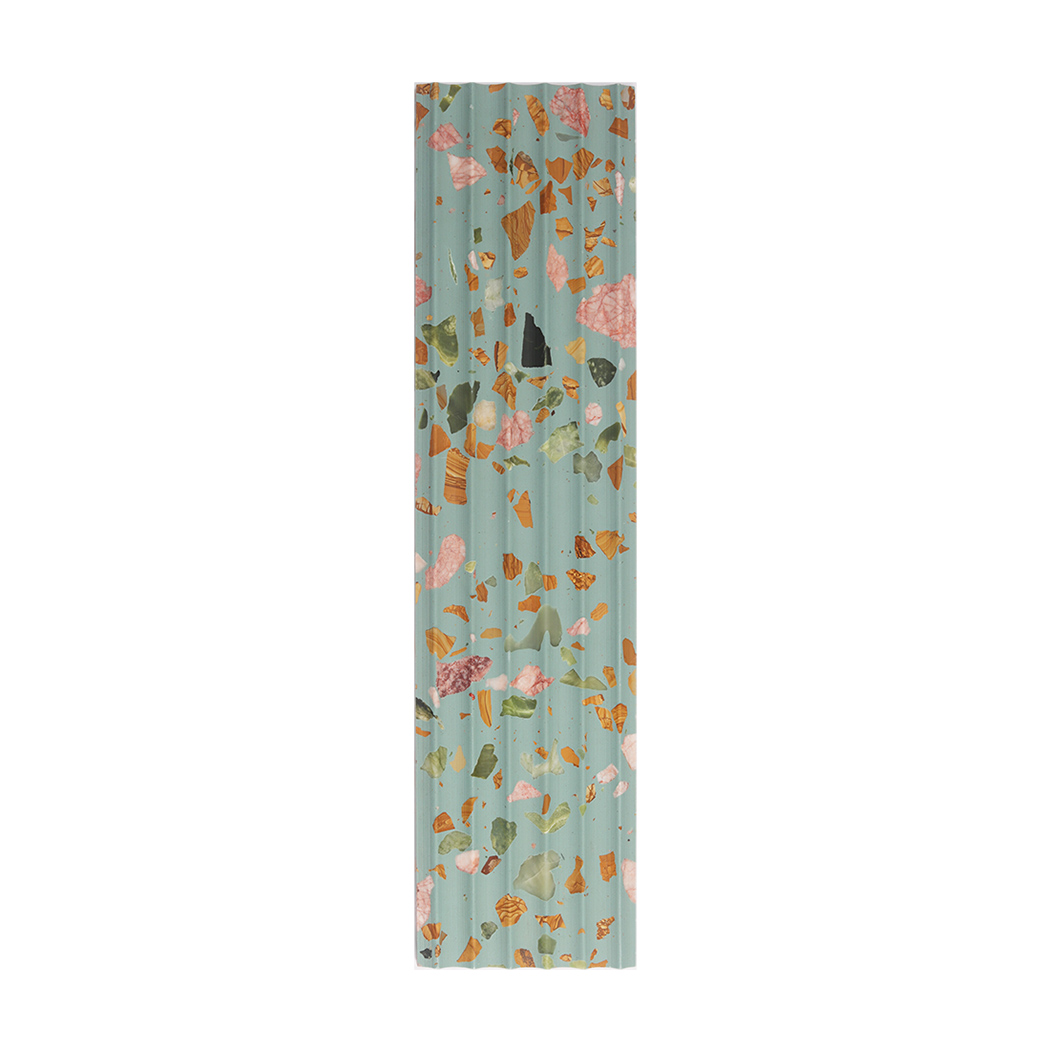 Front view of aqua terrazzo fluted tile with colorful stone fragments