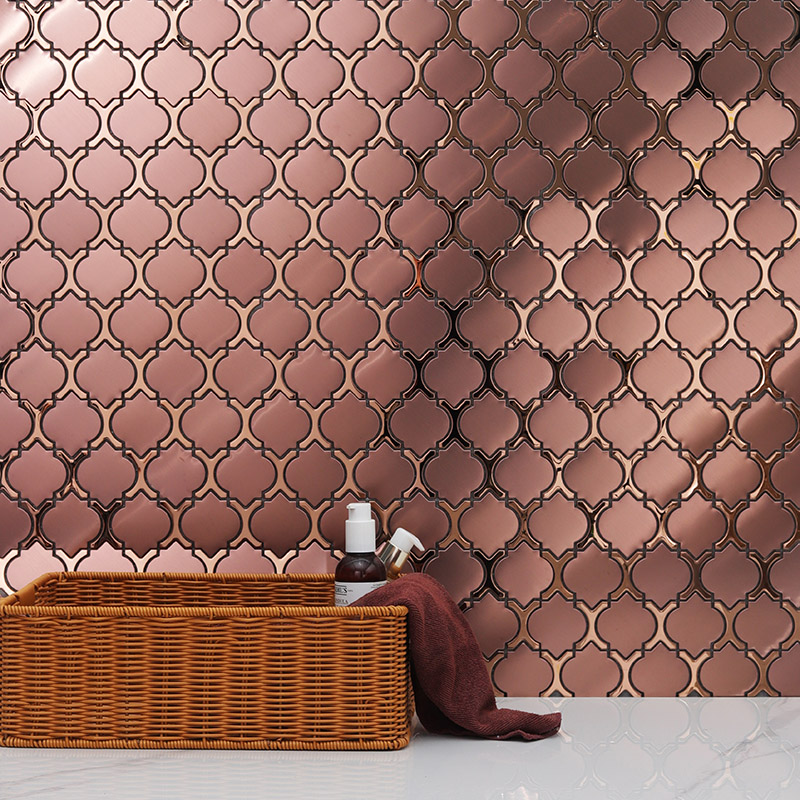 Rose gold metal Arabesque Backsplash Tiles on a wall with bathroom or kitchen decor.