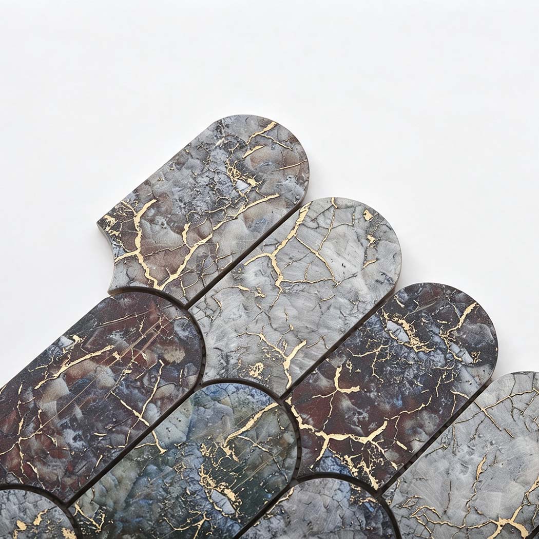 Top corner closeup of arch leaf aluminum mosaic showing gold vein detail
