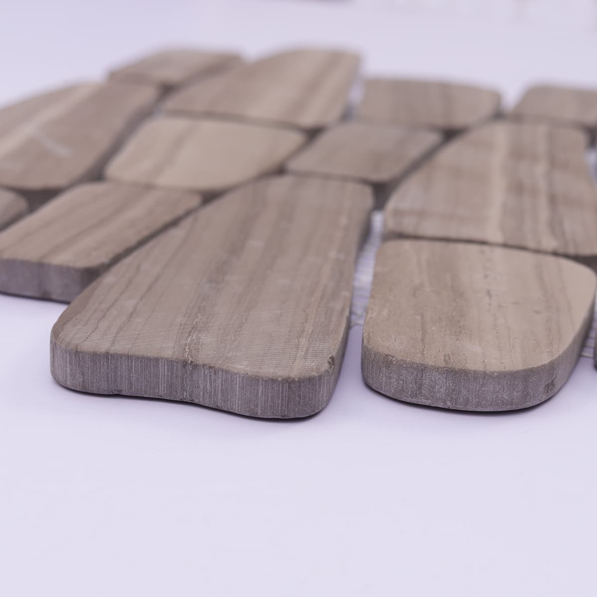 Side view showing tile thickness and honed finish