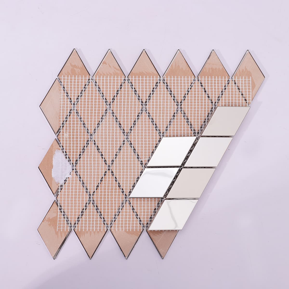 Backside view showing mesh backing on silver metal mosaic