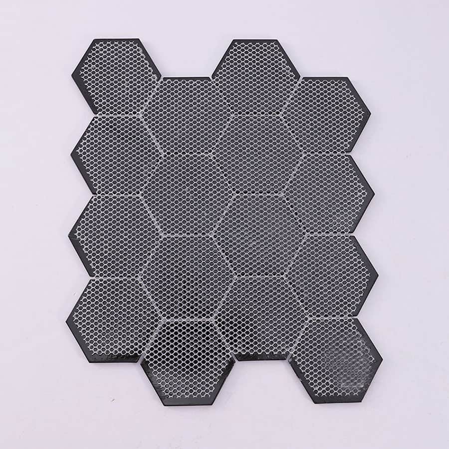 Back side of hexagon mosaic tile sheet with mesh backing
