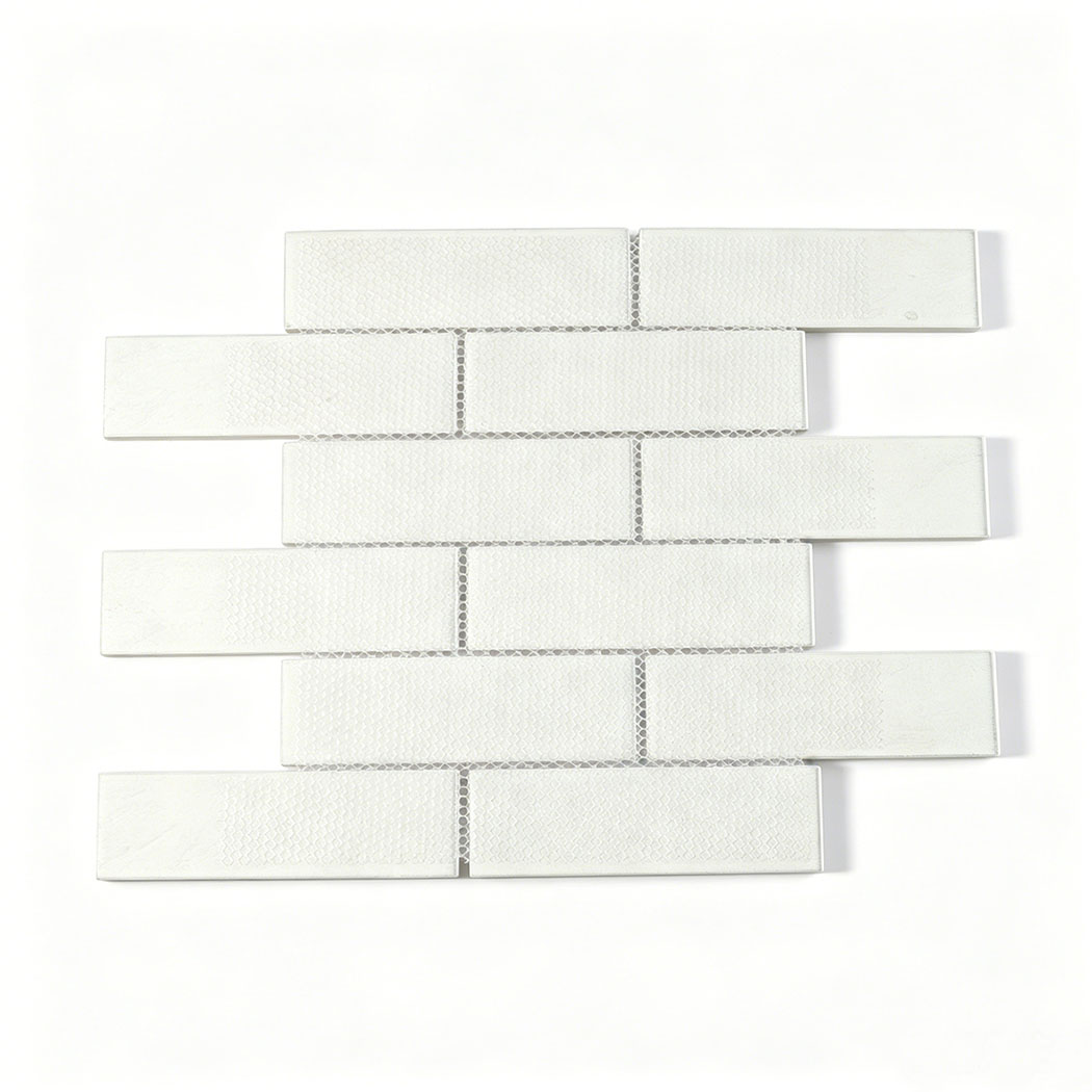 Back side of mesh mounted white glass subway tile sheet in offset pattern