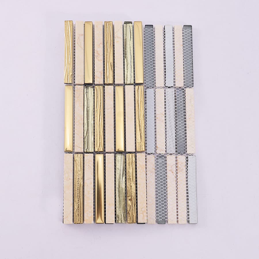 Back side of gold glass and beige marble linear mosaic tile with mesh backing