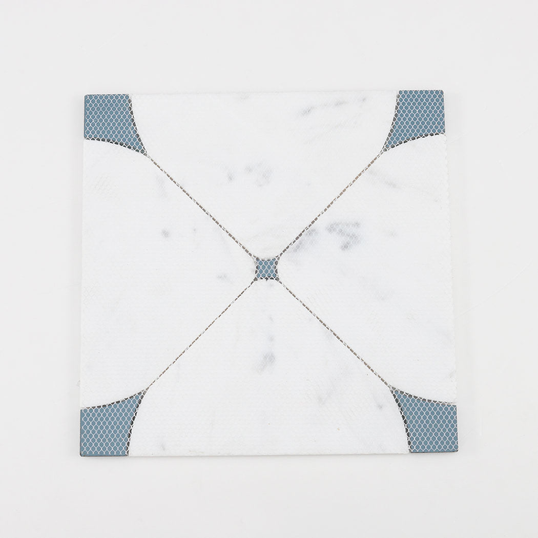 The back view of the mosaic tile showing the white mesh backing used for installation.