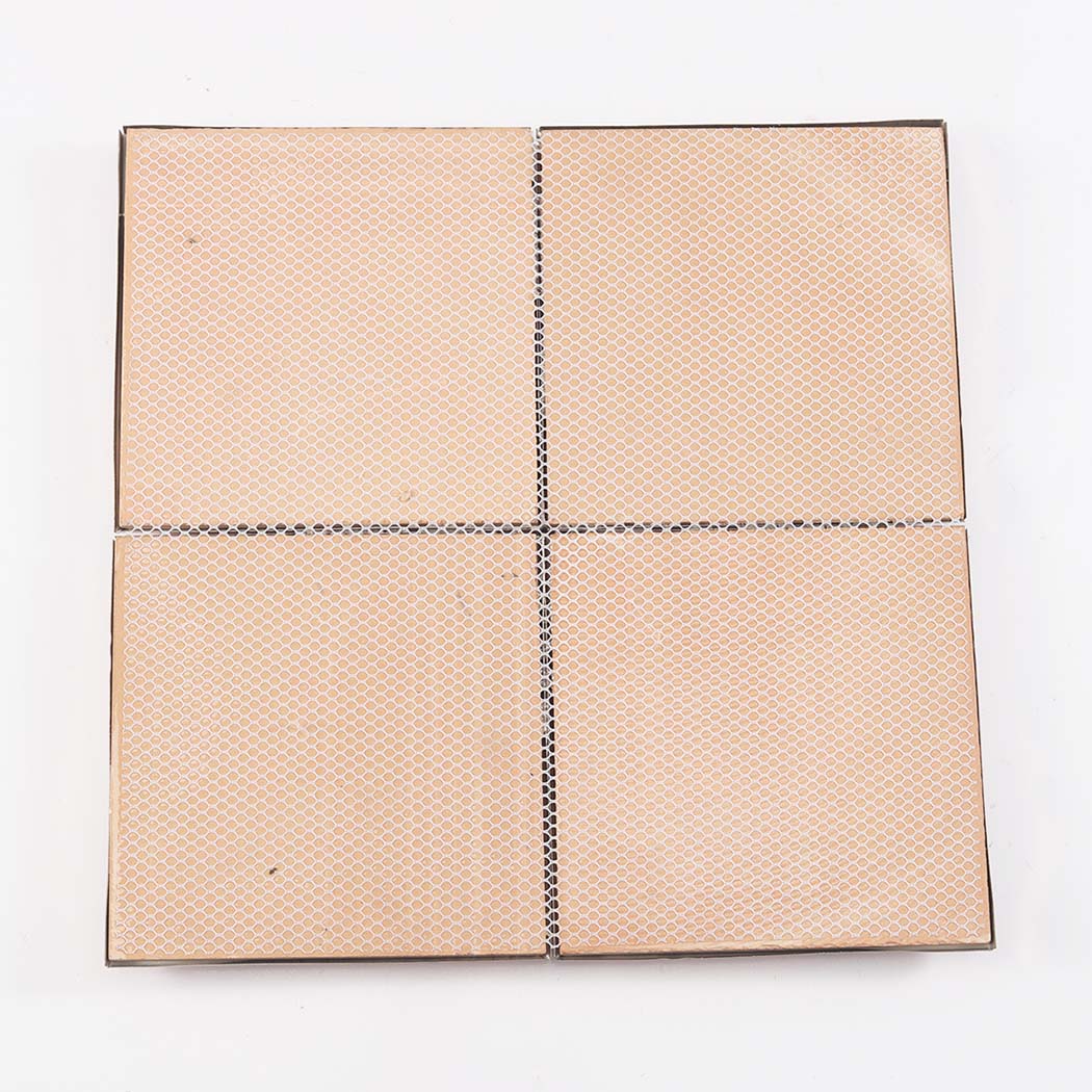 The reverse side of the rose gold 3D tiles showing the mesh backing for easy installation.