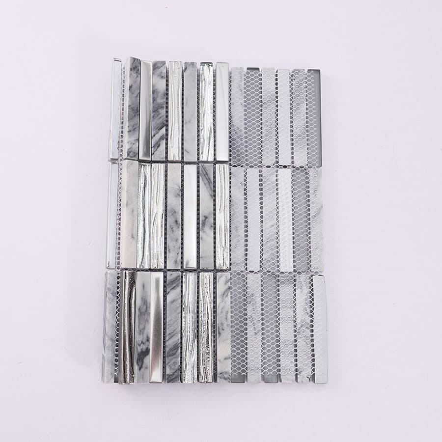 Back side of silver glass and gray marble mosaic tile with mesh backing