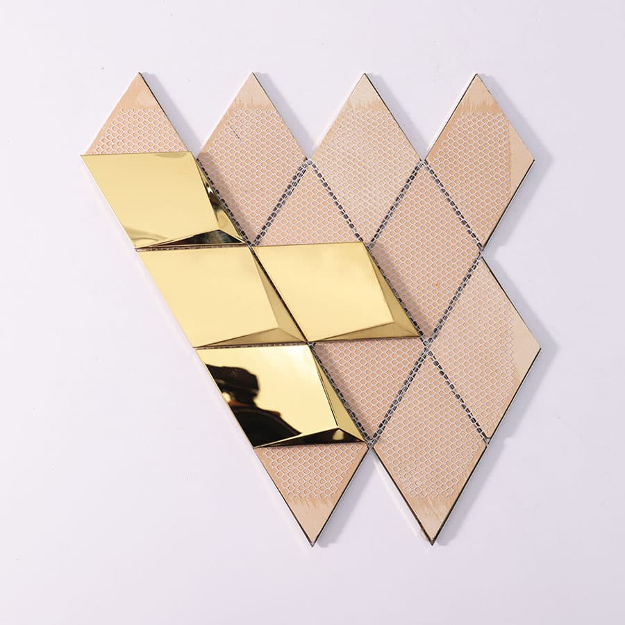 Back view of gold stainless steel 3D diamond mosaic tile sheet with mesh backing