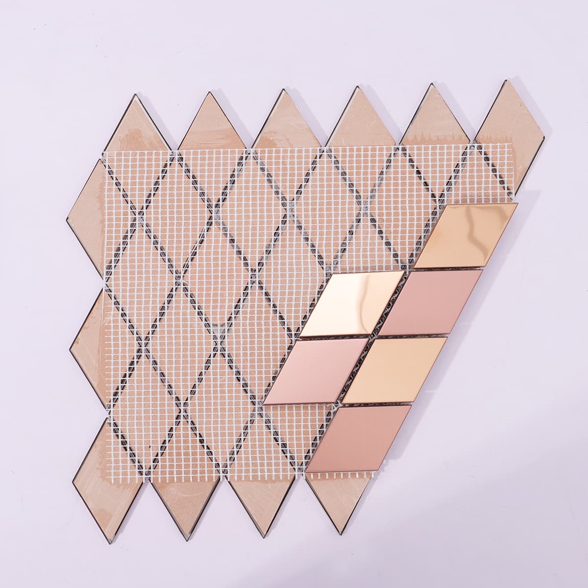  Backside view showing mesh backing on rose gold metal mosaic