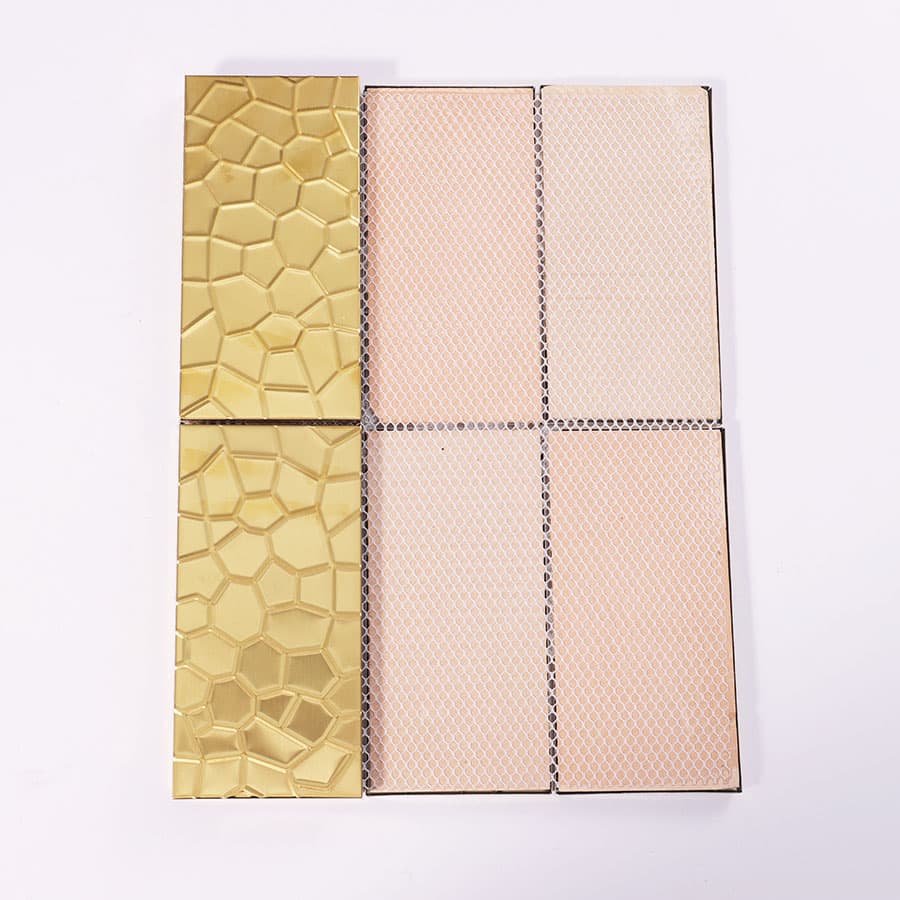 Backside of gold rectangular stainless steel mosaic sheet with mesh backing