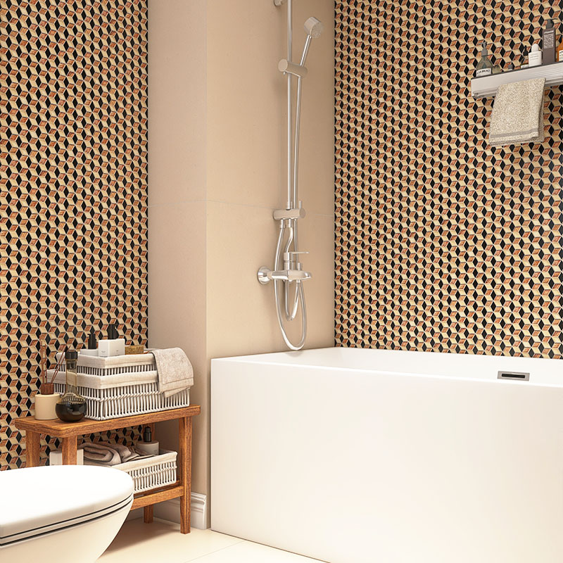 Bathroom with beige and black geometric mosaic wall tiles around the bathtub