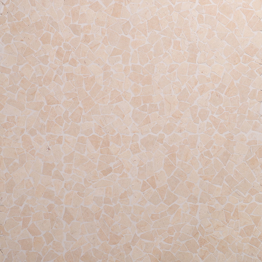 Close-up texture of beige natural stone flat pebble mosaic tiles with irregular patterns.
